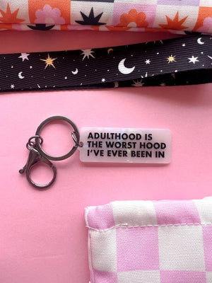 Adulthood Is The Worst Hood Keychain - 1
