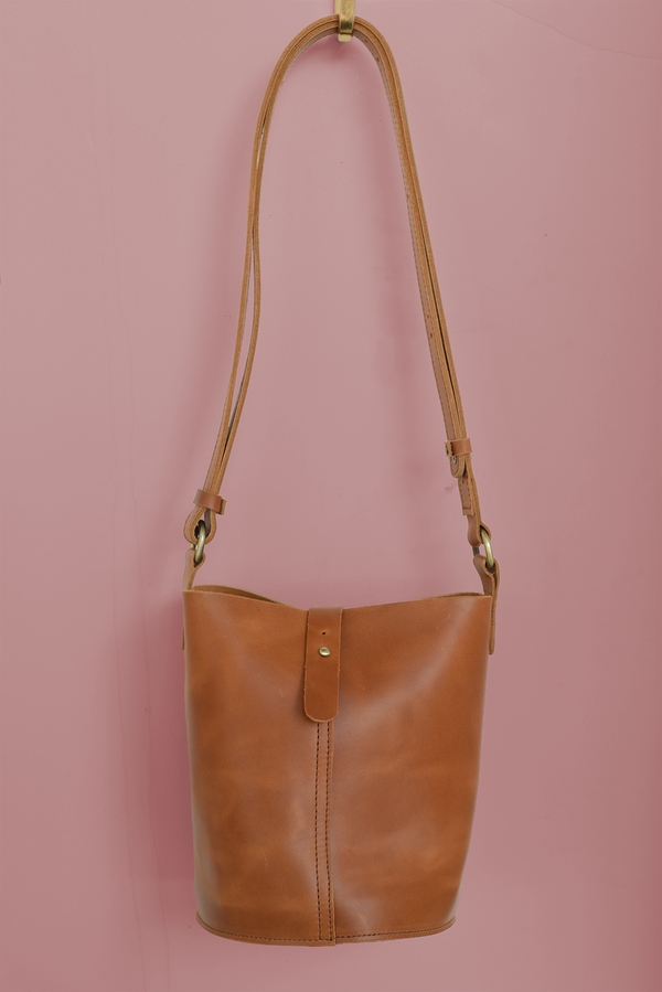 611fc05e3c4ce80992caae23_bucket-bag-brown-front_1785429982656.png