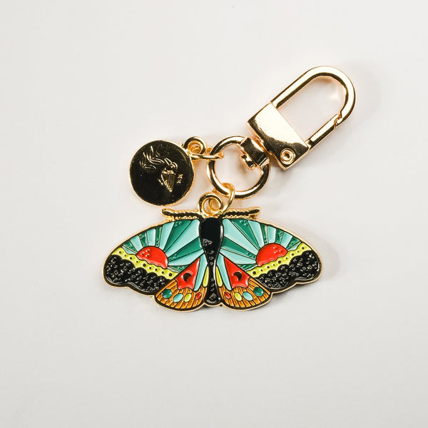 611fc05e3c4ce80992caae23_cosmic-moth-keychain-3_1790897078432.jpg