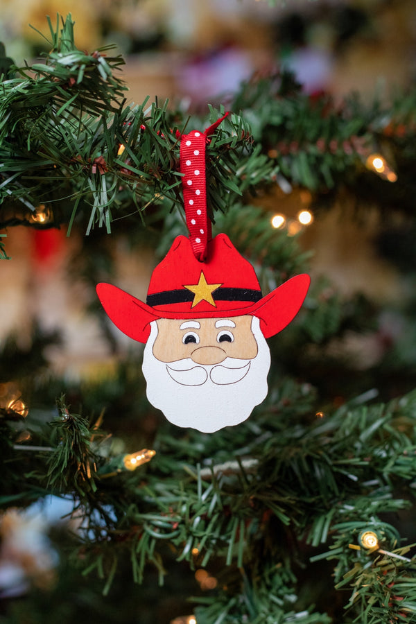 611fc05e3c4ce80992caae23_cowboy-santa-ornament_1753037773343.jpg