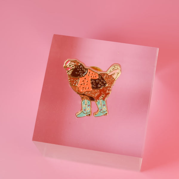 611fc05e3c4ce80992caae23_cowgirl-chicken-pin-1_1783030040012.jpg