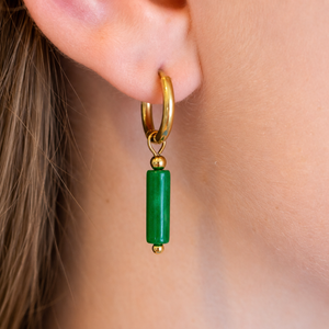 611fc05e3c4ce80992caae23_green-stone-charm-dangle-huggies-model_1791497127509.png