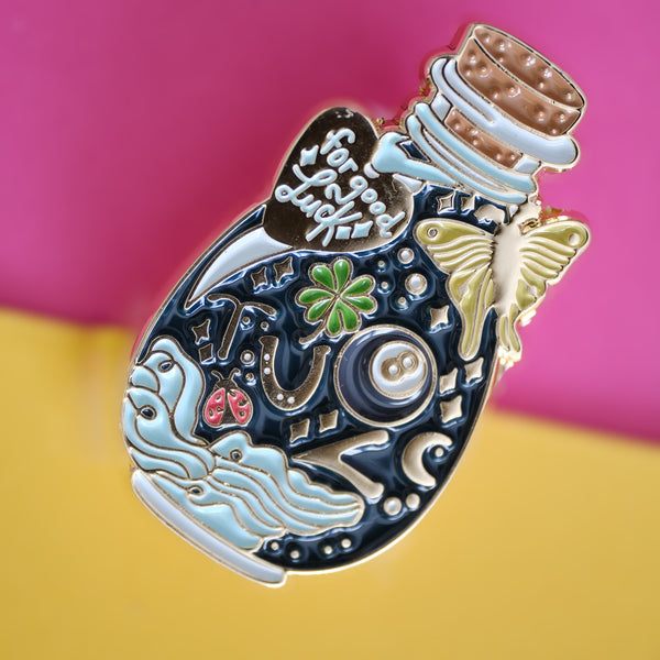 611fc05e3c4ce80992caae23_or-good-luck-bottle-pin-2_1790812815578.jpg