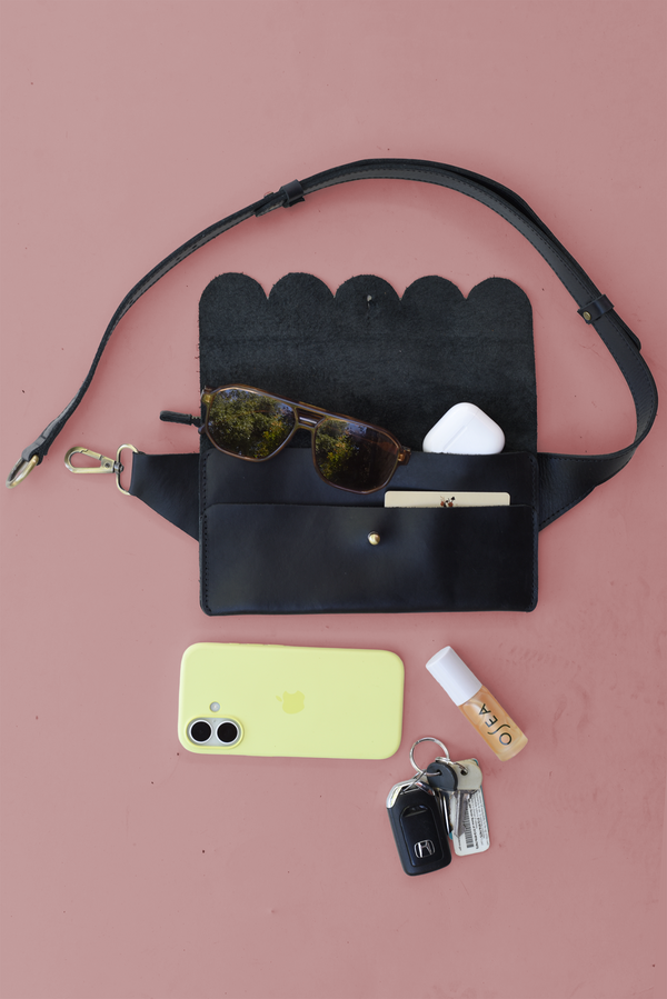 611fc05e3c4ce80992caae23_scallop-sling-bag-black-open-ed_1785430390044.png