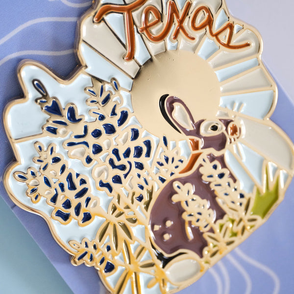 611fc05e3c4ce80992caae23_texas-white-tailed-rabbit-with-blue-bonnets-pin-4_1790869493061.jpg