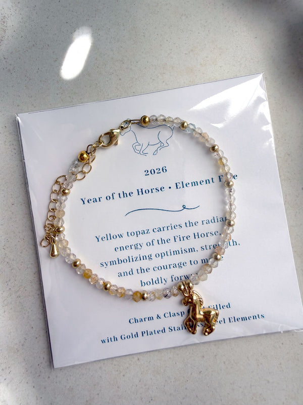 611fc05e3c4ce80992caae23_year-of-the-horse-bracelet-topaz-12_1771023048614.jpg