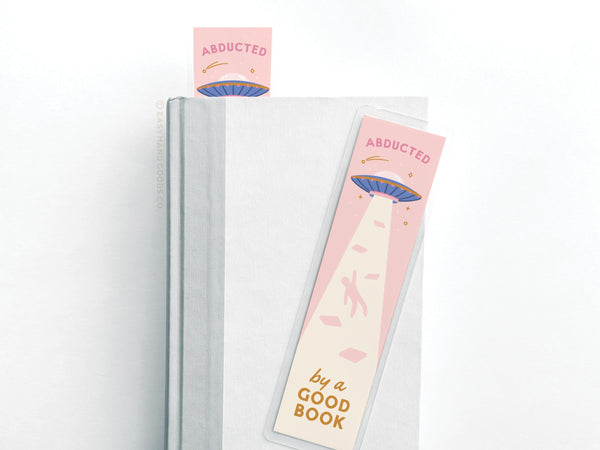 Abducted By A Good Book Laminated Bookmark